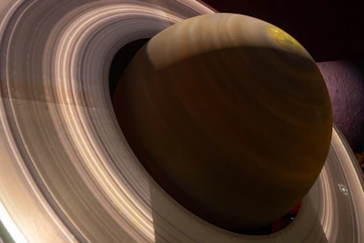 A crisp, detailed close-up of Saturn's hexagonal storm, highlighting its sharp edges and swirling clouds.