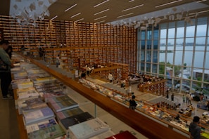 A public institutional project featuring a modern library with open, airy interiors and natural light.