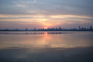 A serene view of Panama City skyline at sunset.