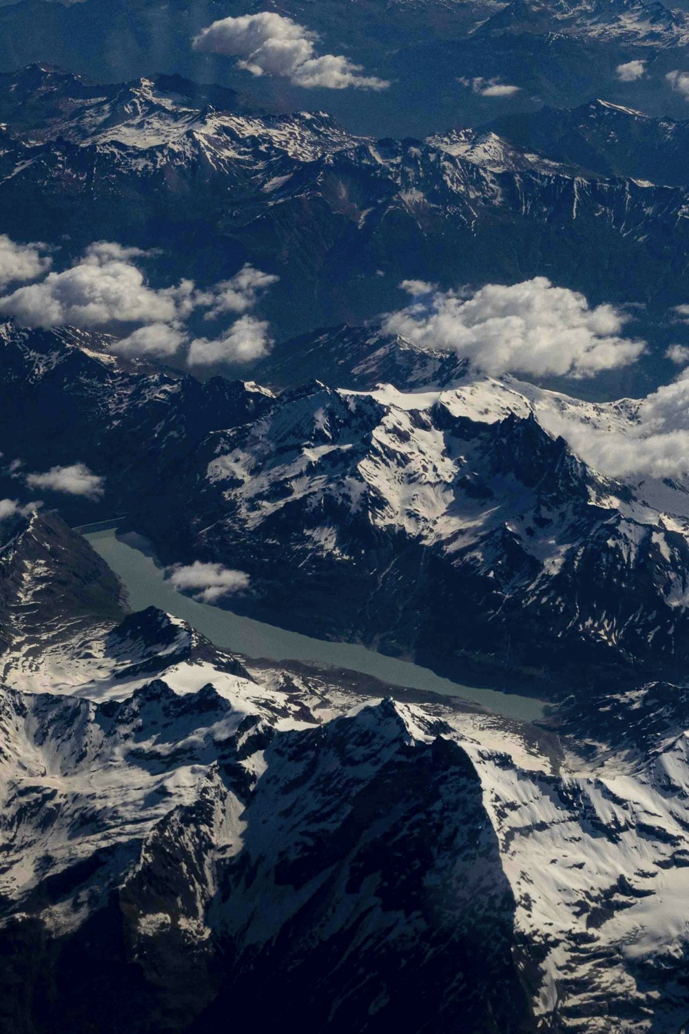 a view of a mountain range from an airplane