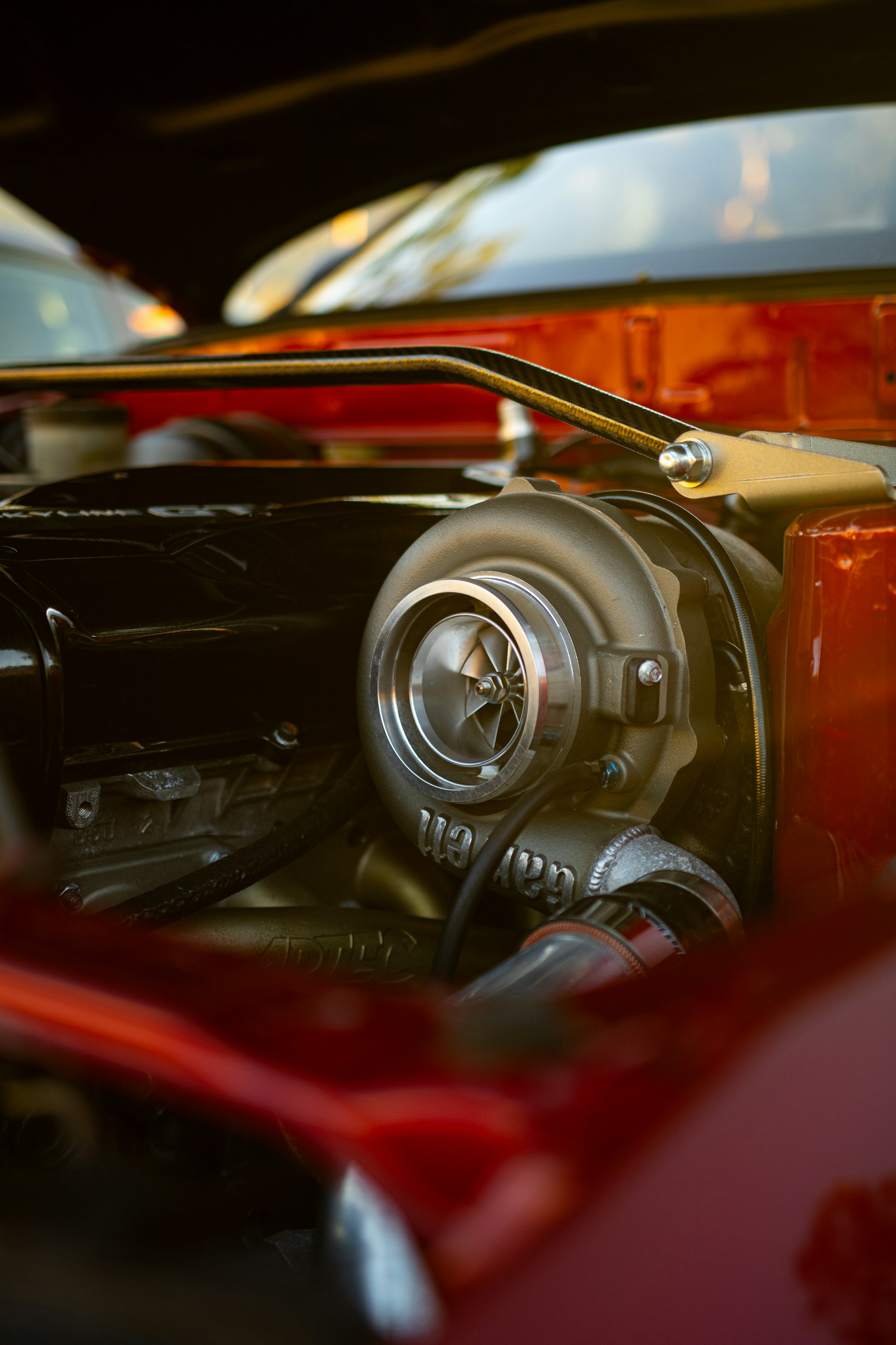 Cross-sectional view of a diesel engine highlighting the turbocharger and exhaust system.