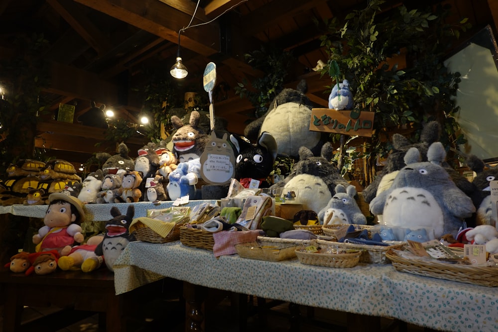 a bunch of stuffed animals on a table