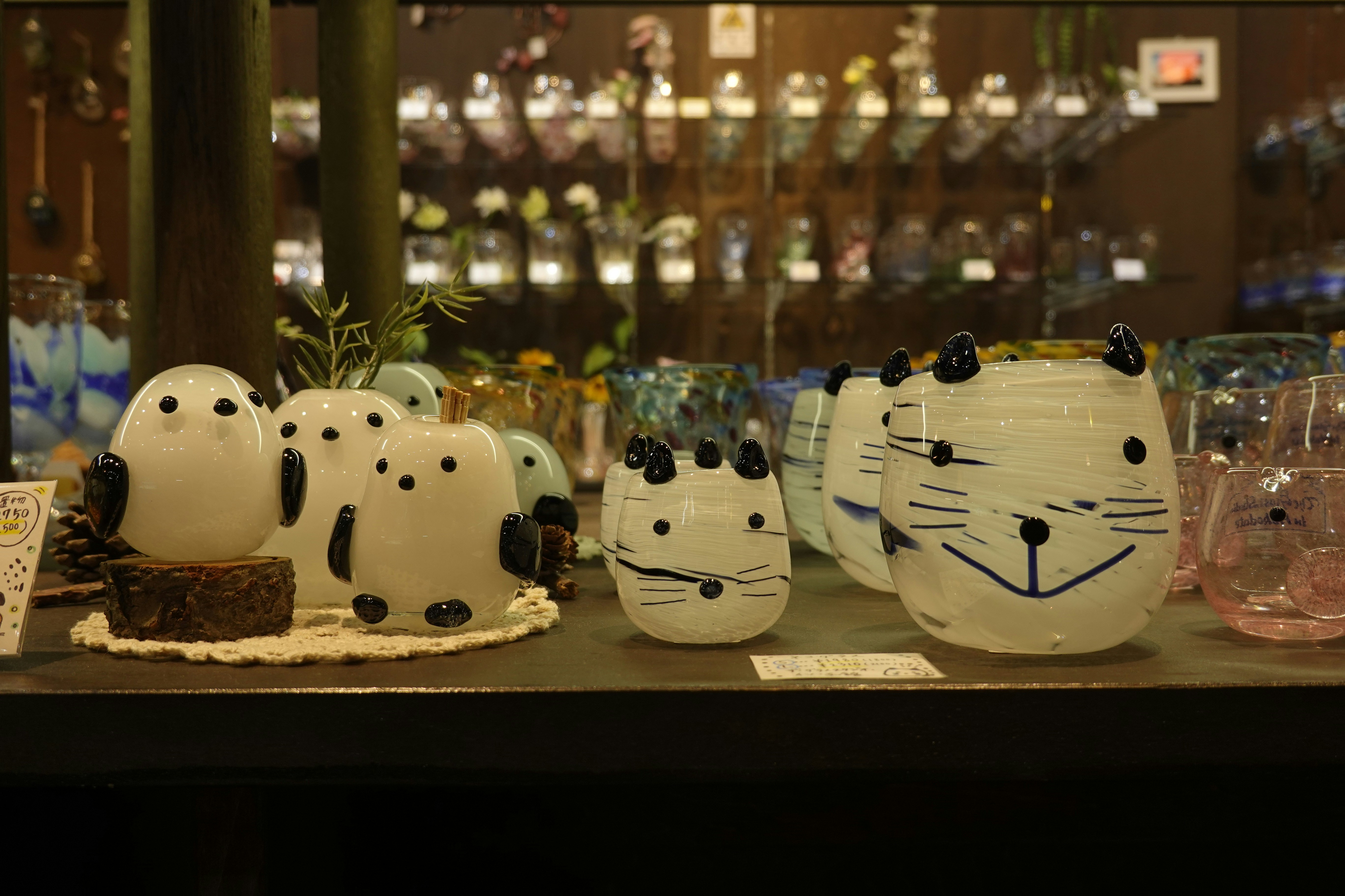 a group of glass animals sitting on top of a table