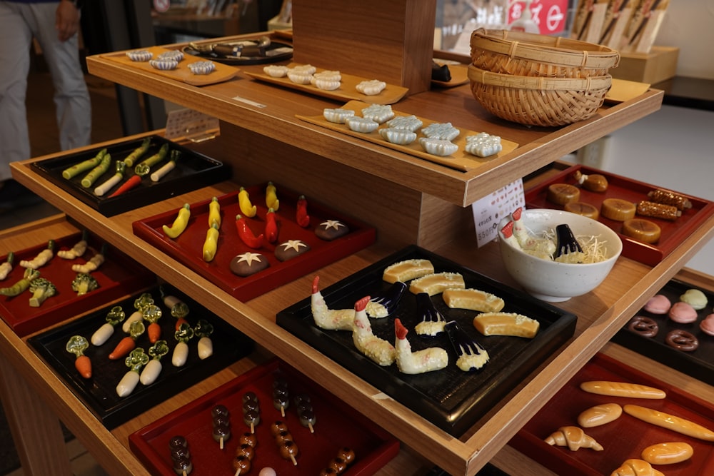 a display of different types of food on trays