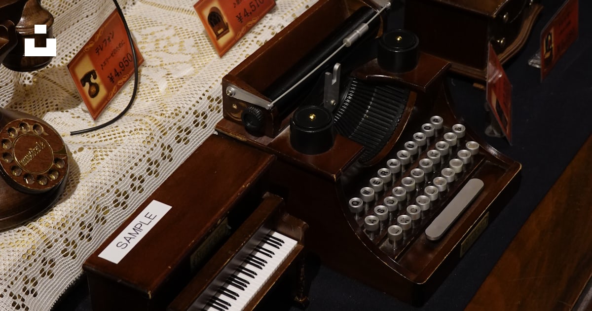 A table topped with lots of musical instruments photo – Free Furniture ...