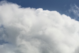 A calm blue and white cloud with a secure lock symbol glowing softly.