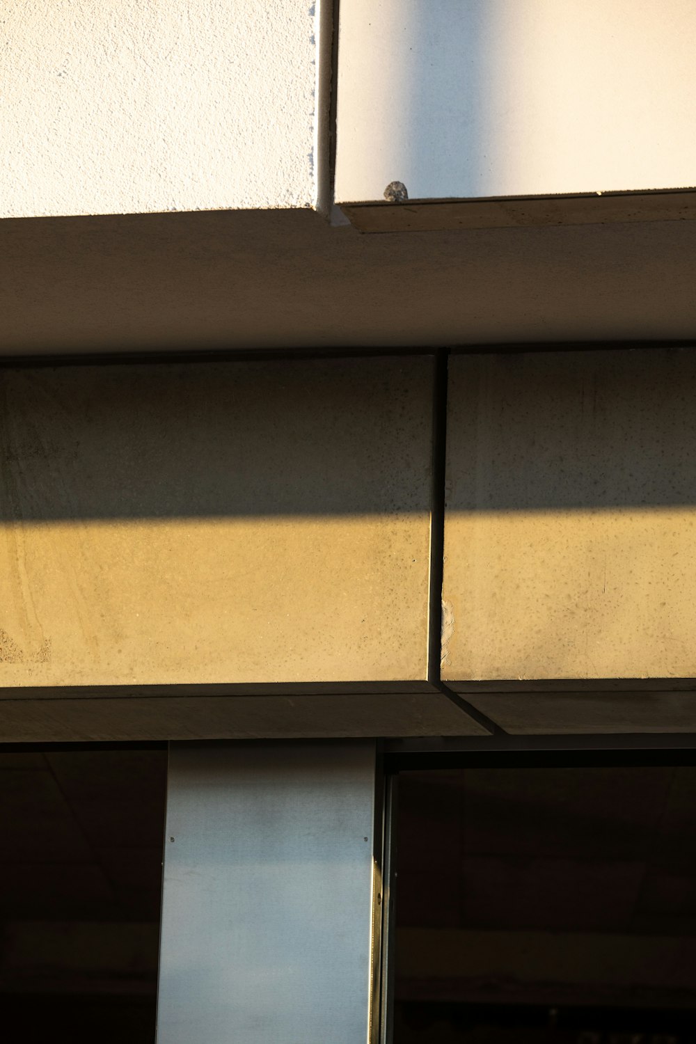 a close up of a clock on the side of a building