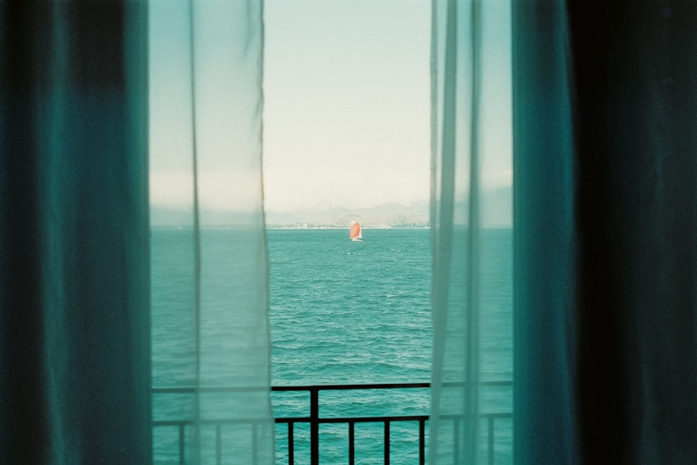 a view of the ocean from a window