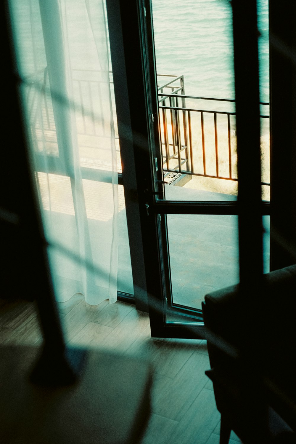 a view of a balcony through a window