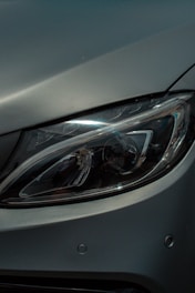 a close up of a car's headlight