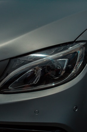 a close up of a car's headlight