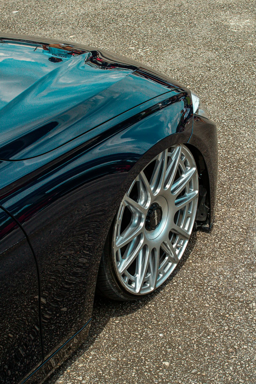 a close up of a car parked in a parking lot