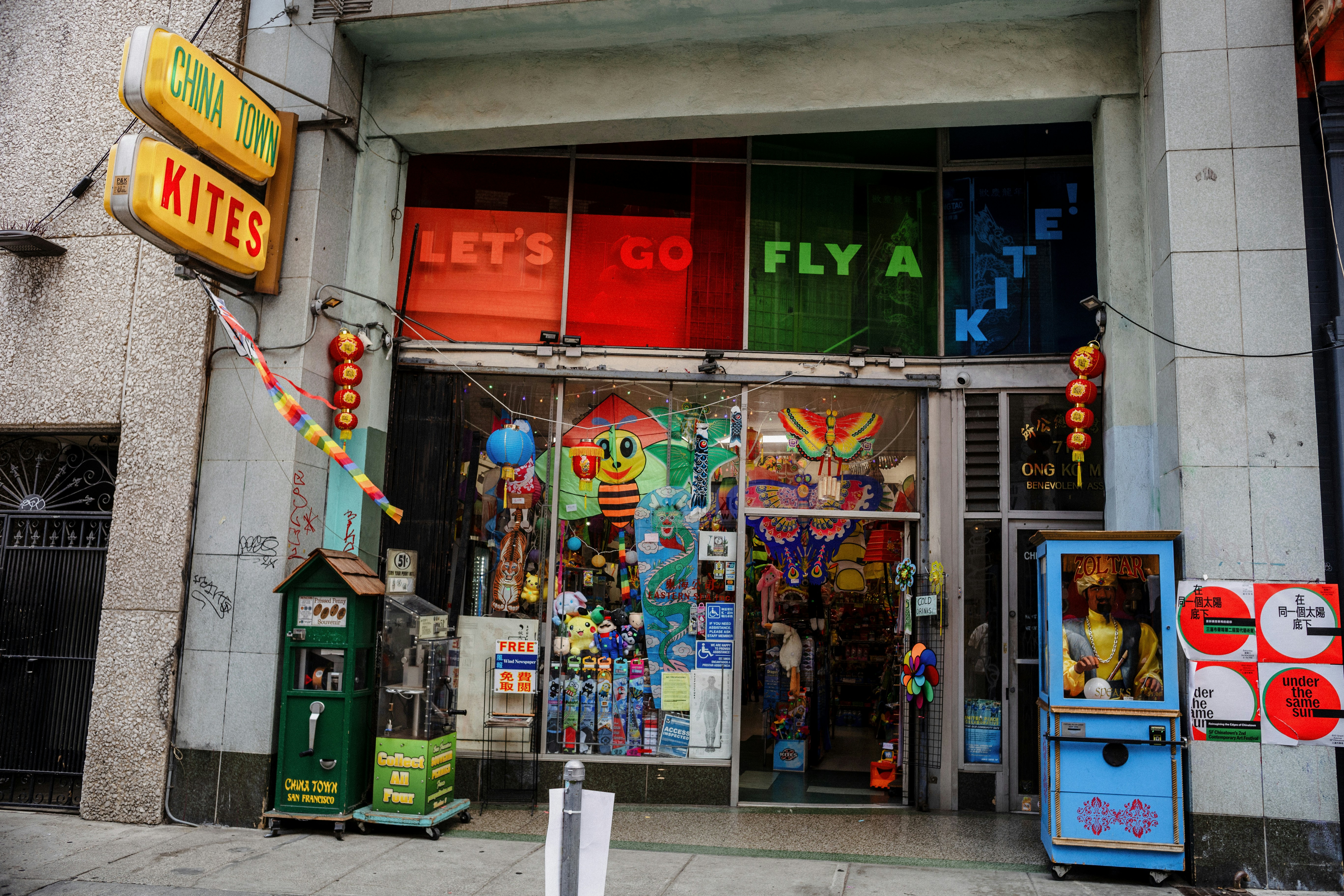 a store front with a lot of signs on it