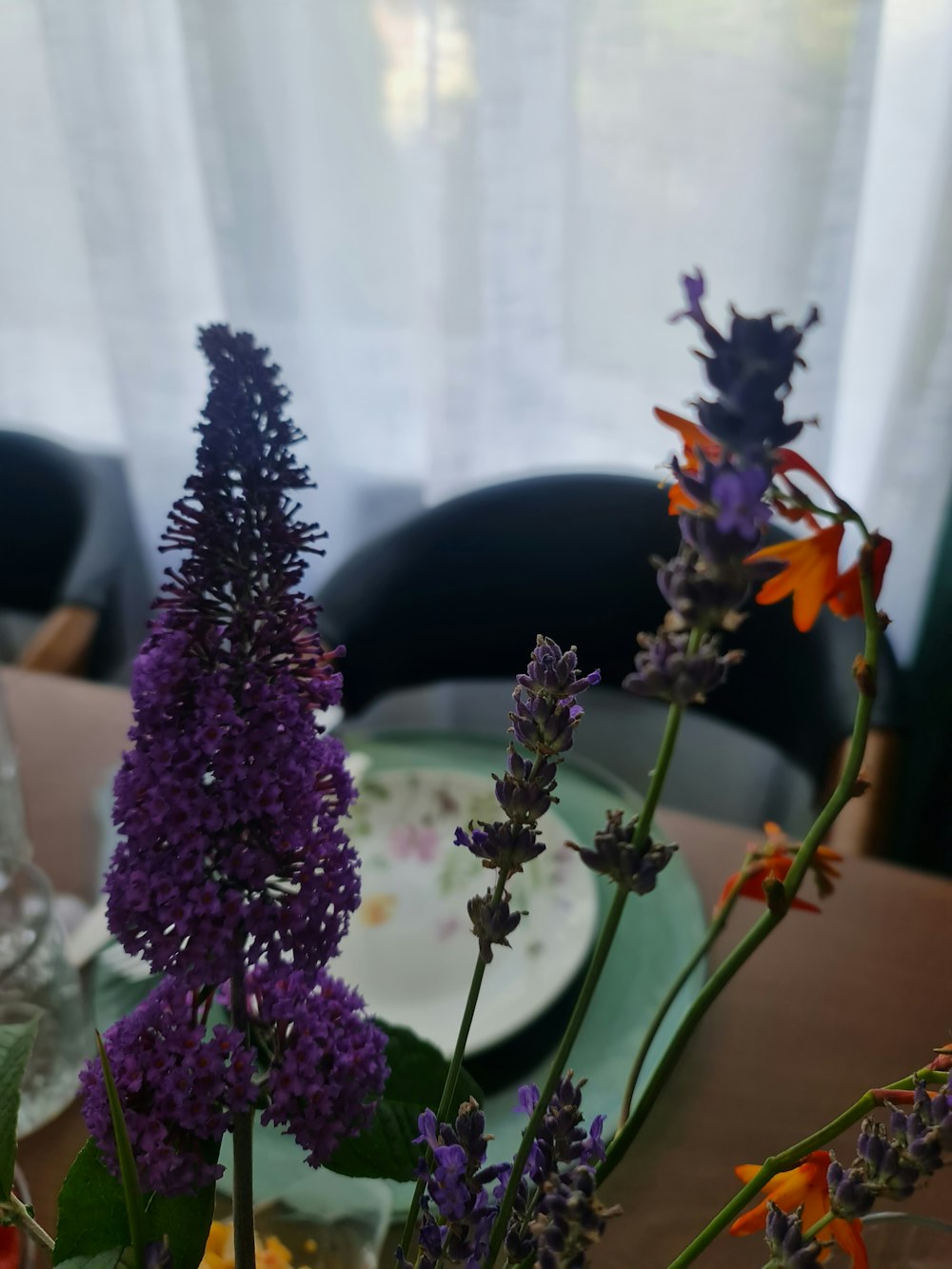 a bunch of flowers that are sitting on a table