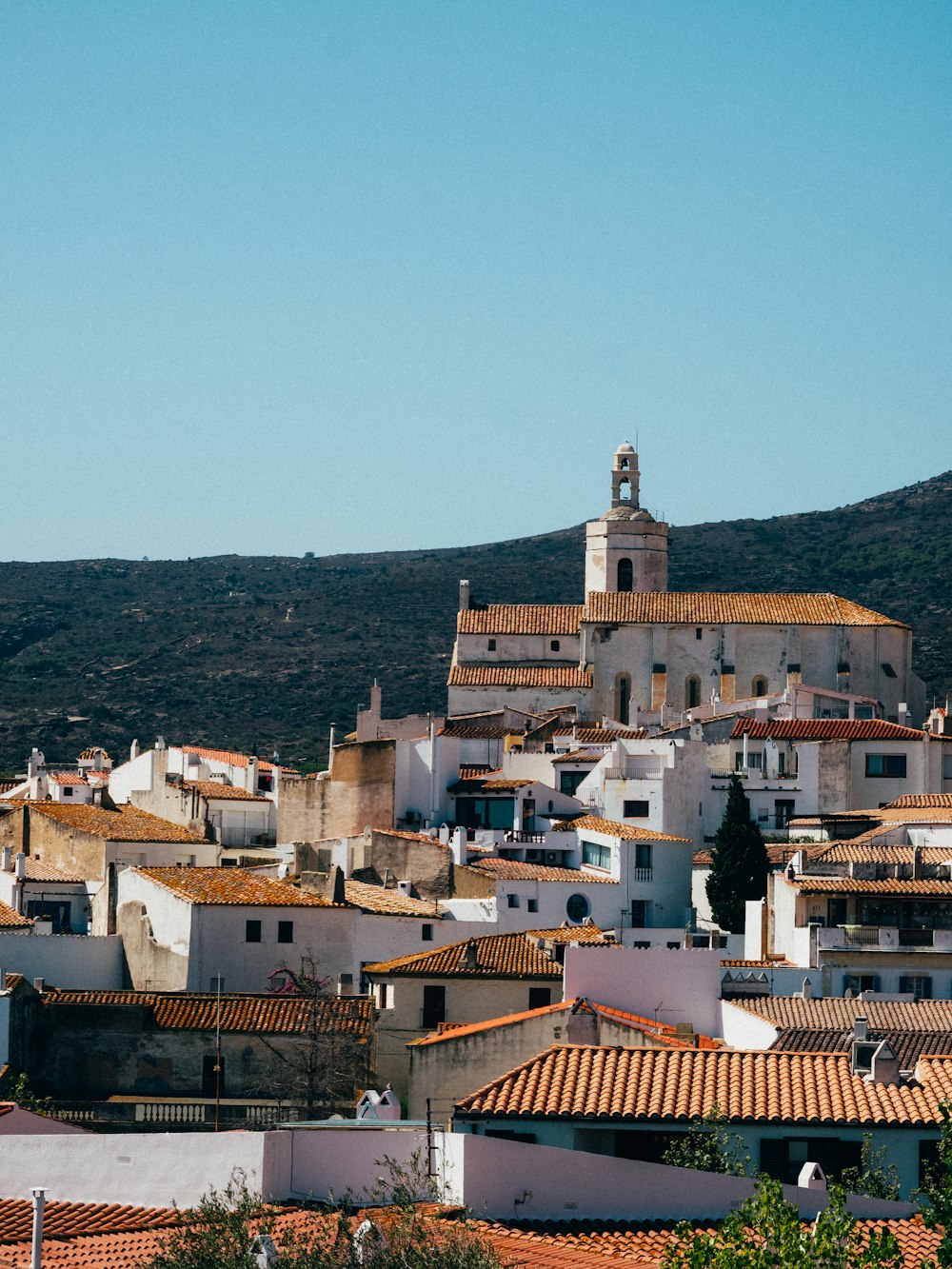 a view of a town with a clock tower