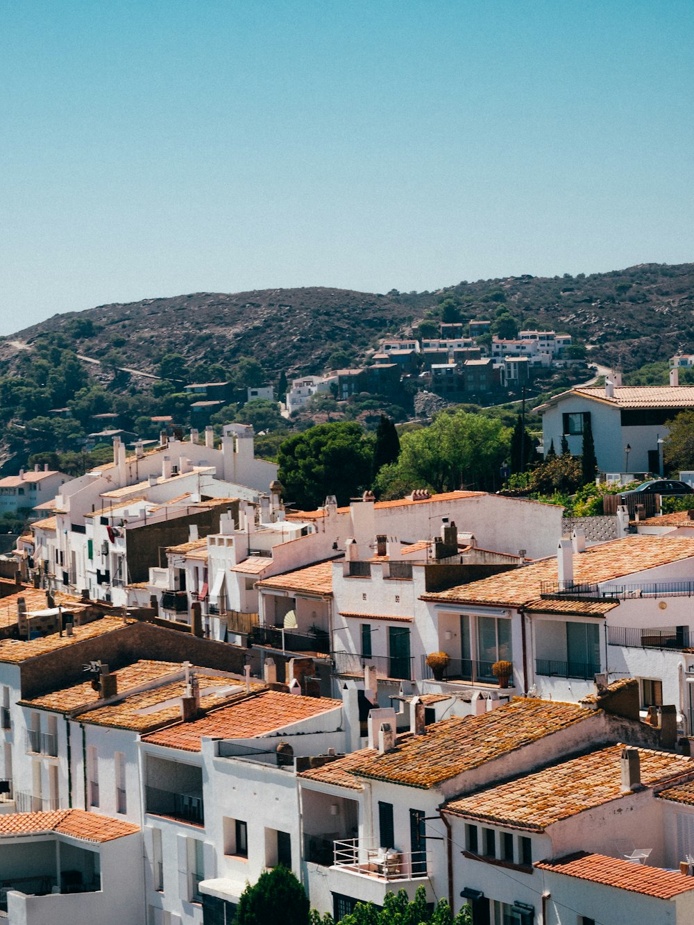 a view of a city with lots of white buildings