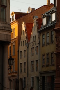 Historic architecture of Lille's old town bathed in warm sunlight.