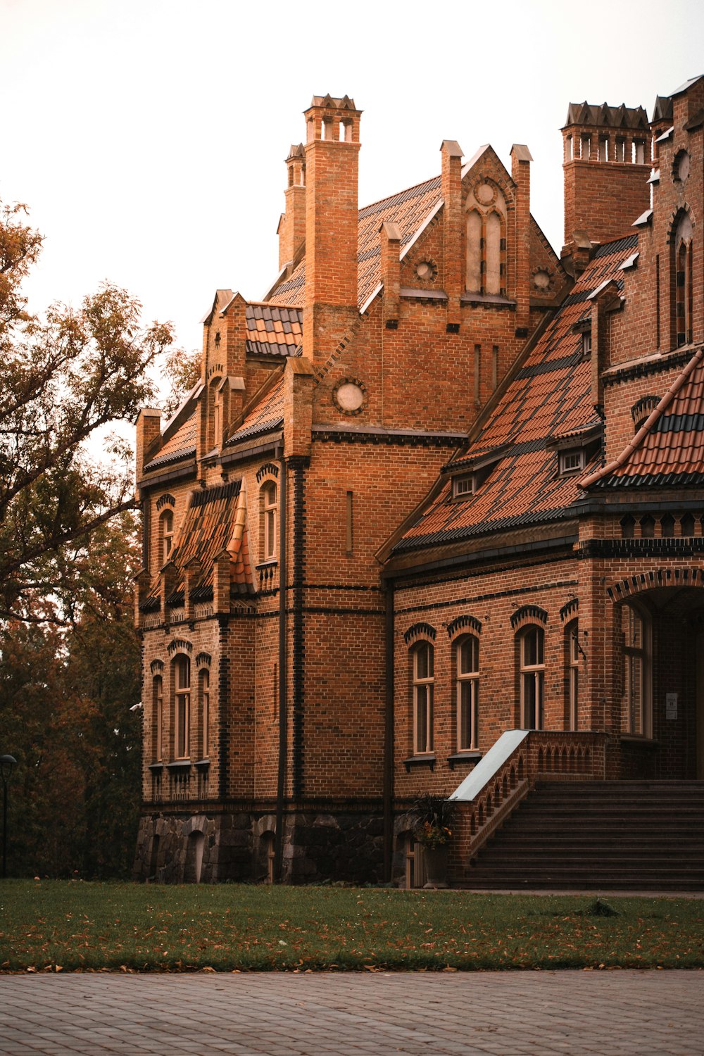 a large brick building with a clock tower