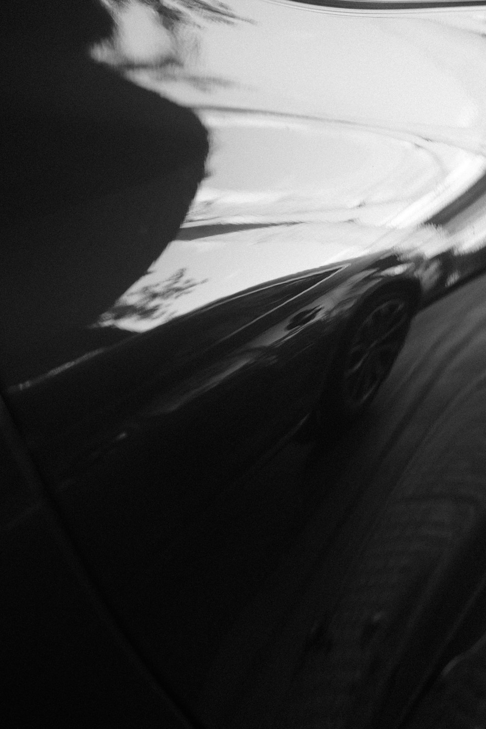 a black and white photo of a car