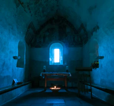 A serene virtual chapel glowing softly on a computer screen.