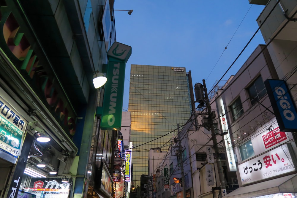 a city street filled with lots of tall buildings