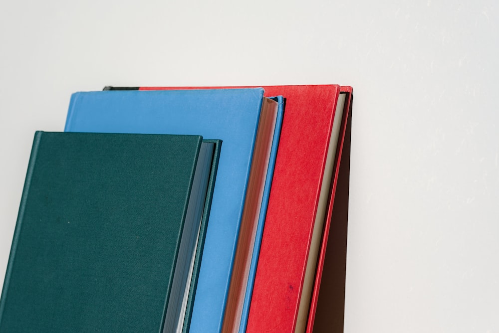 a stack of books sitting next to each other