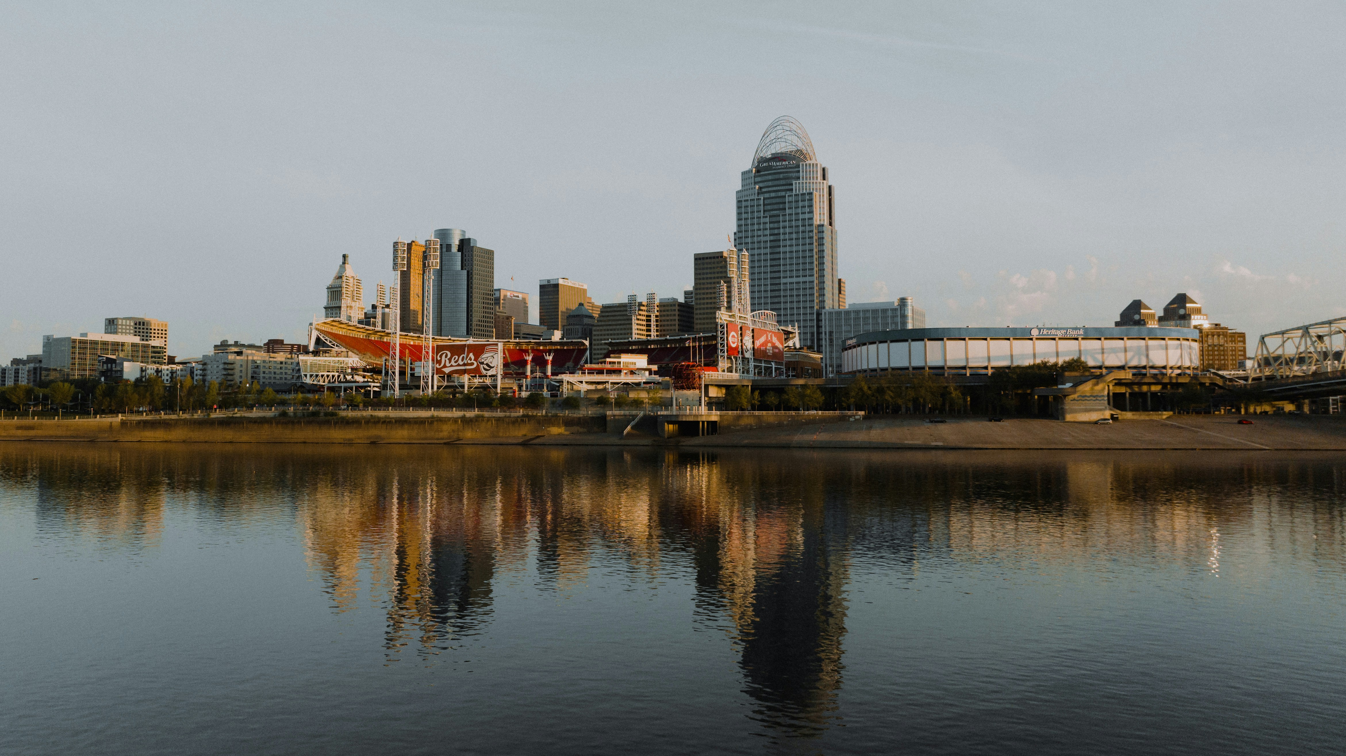 a large body of water with a city in the background