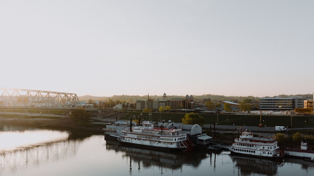 a couple of boats that are sitting in the water