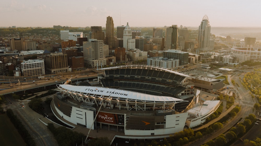 an aerial view of a stadium in a city