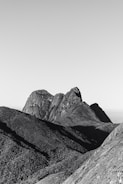 Photograph of Patagonia's mountains and lakes under a clear sky.