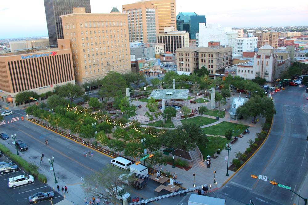 an aerial view of a city with a park in the middle