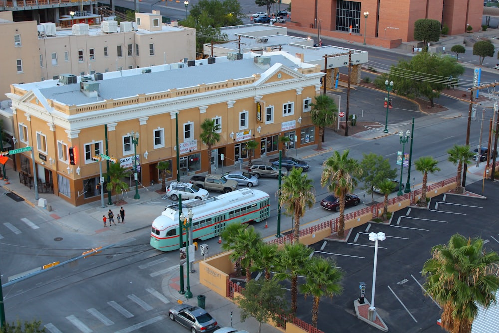 a city intersection with a bus and cars