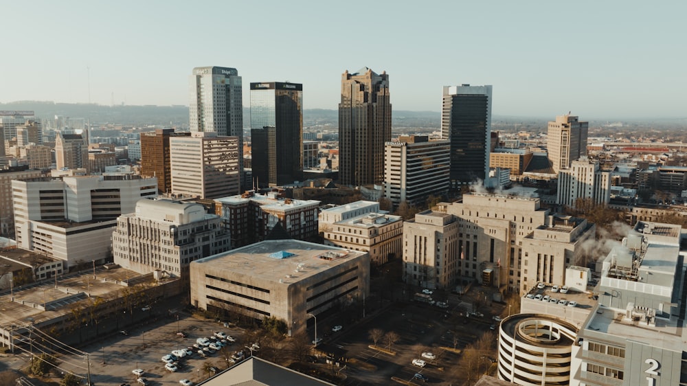 an aerial view of a city with tall buildings