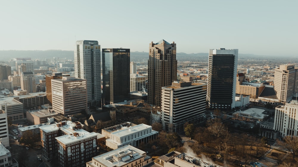 an aerial view of a city with tall buildings