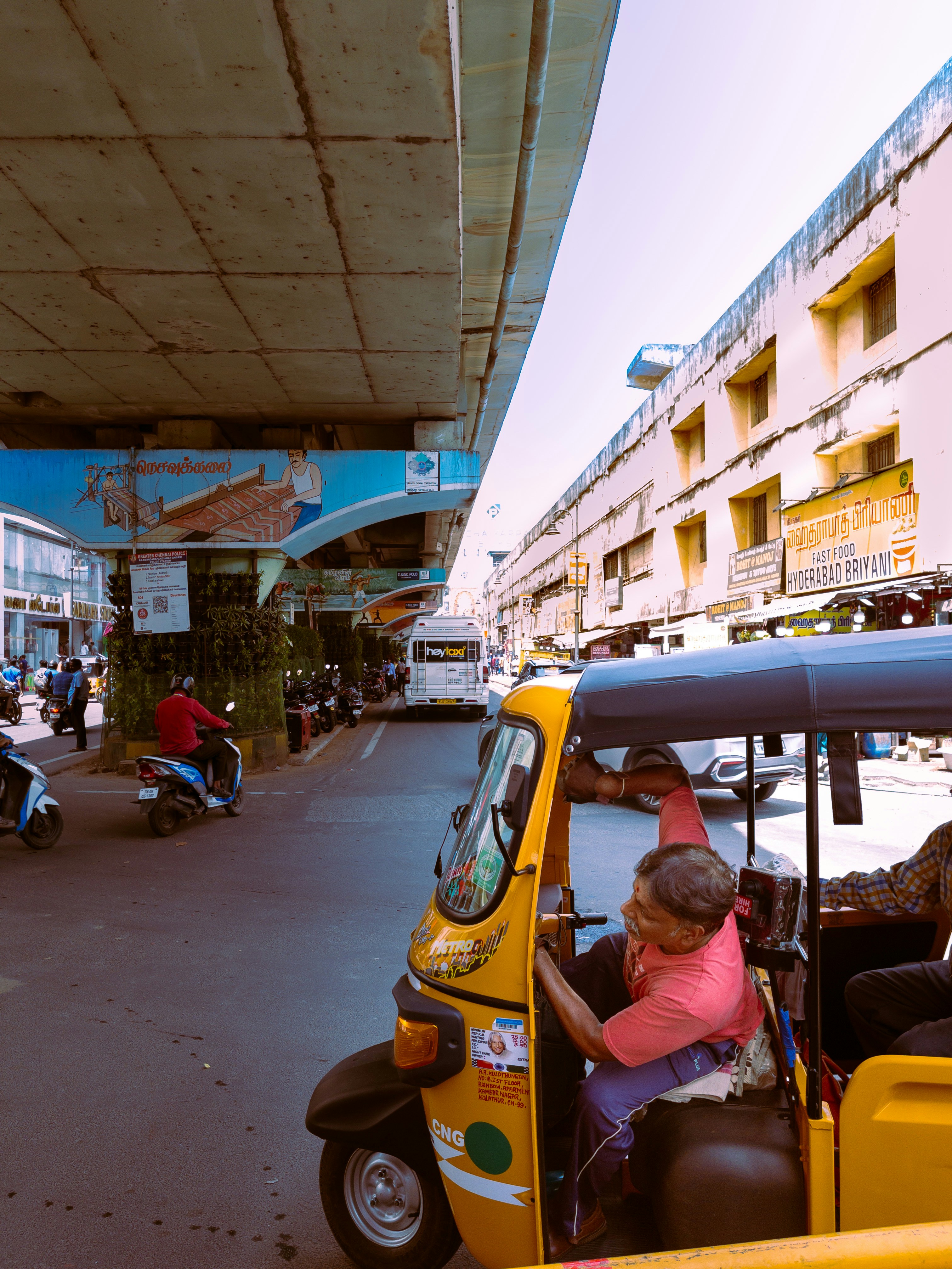 Busy street in Madurai with taxis