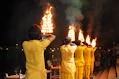 a group of people dressed in yellow standing next to each other