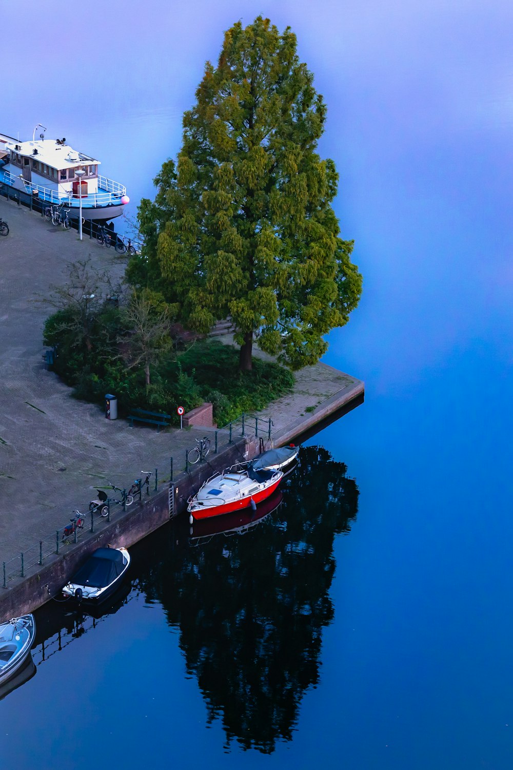 a couple of boats that are sitting in the water