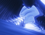 An abstract design featuring blue hues and insurance icons.