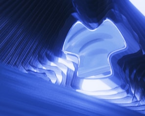 An abstract design featuring blue hues and insurance icons.