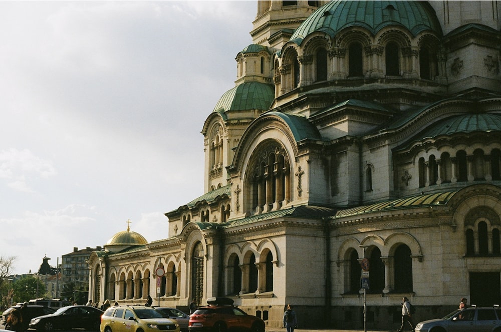 a large building with a green dome on top of it