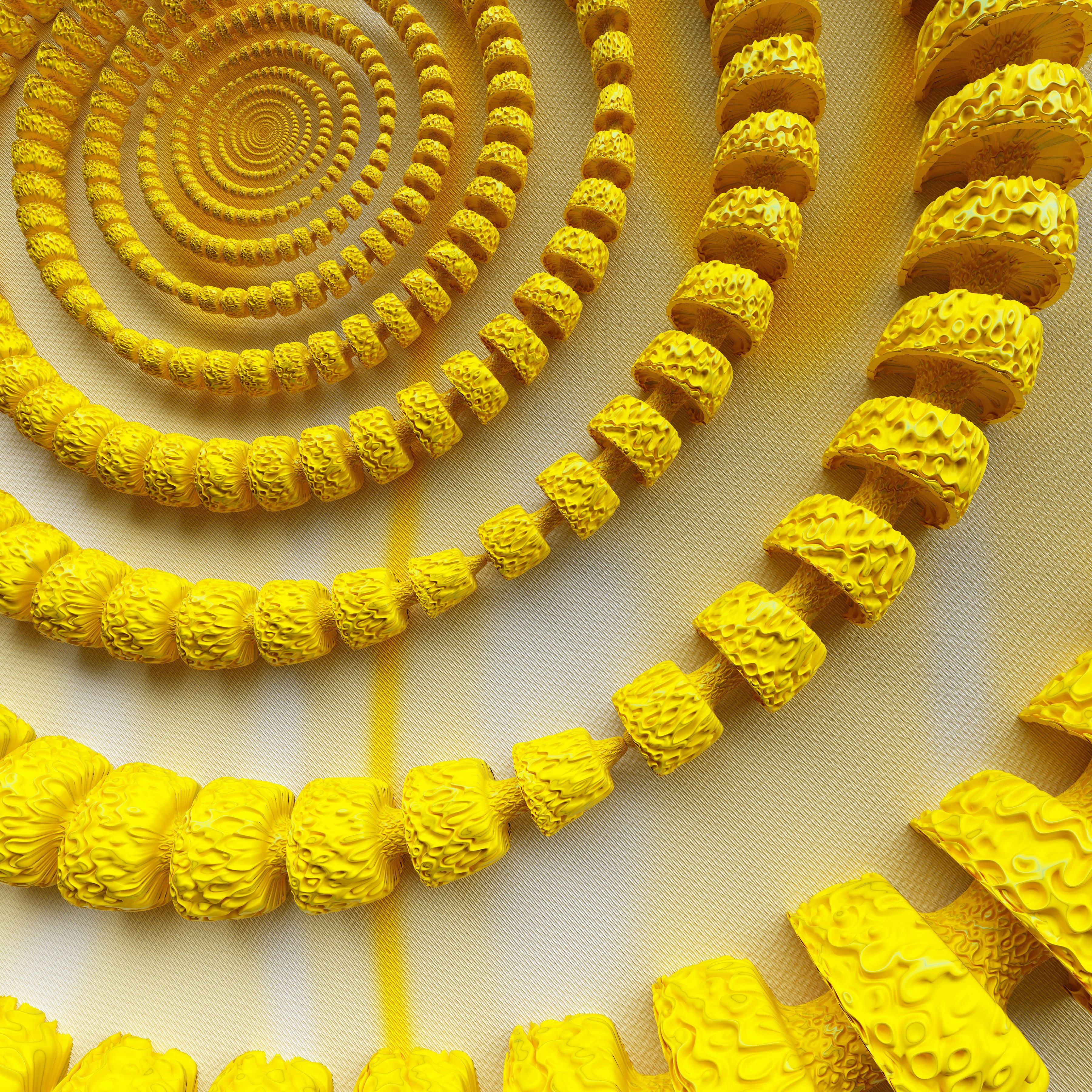 A spiral of yellow objects on a white surface photo – Free Digital ...