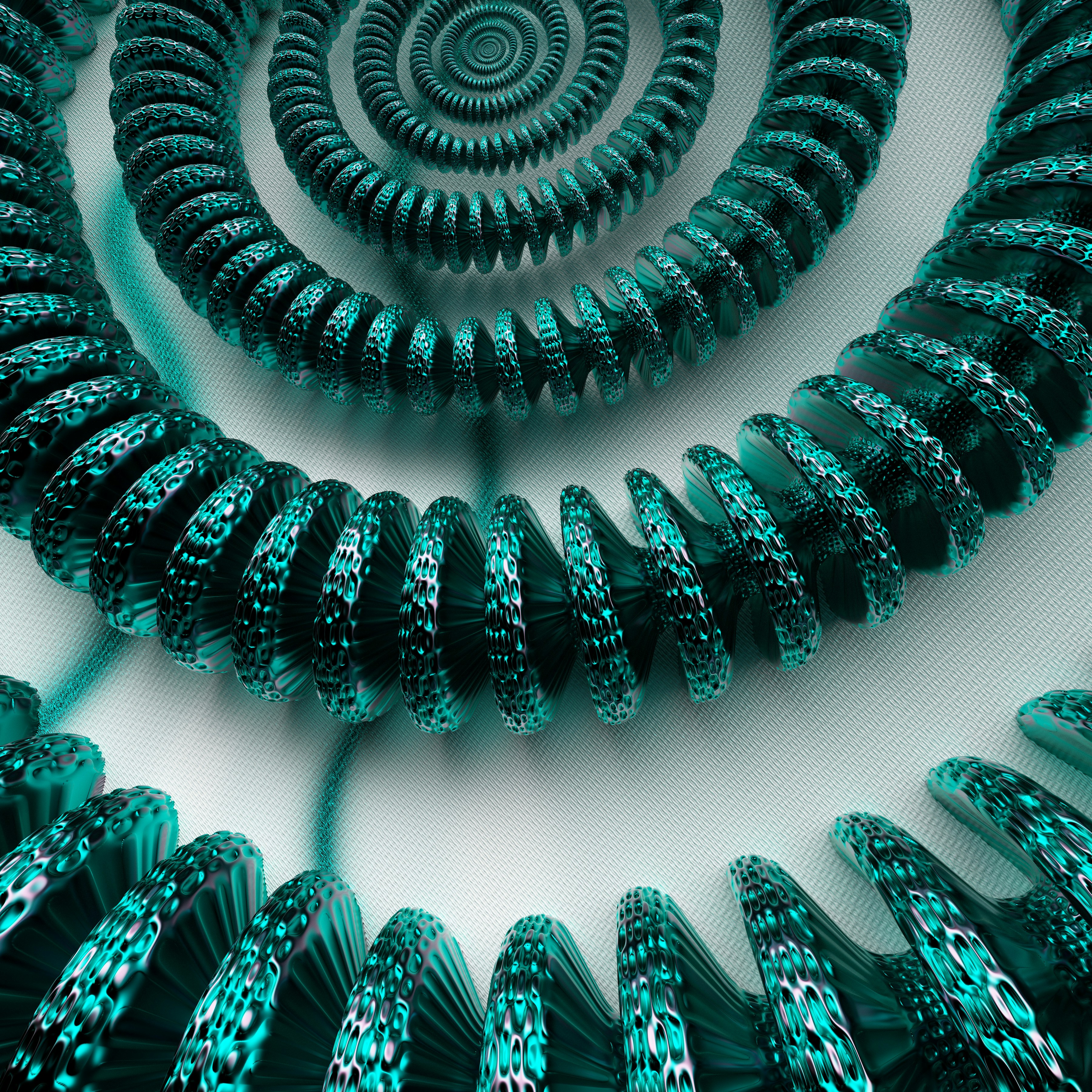 springy: a group of green spirals on a white surface