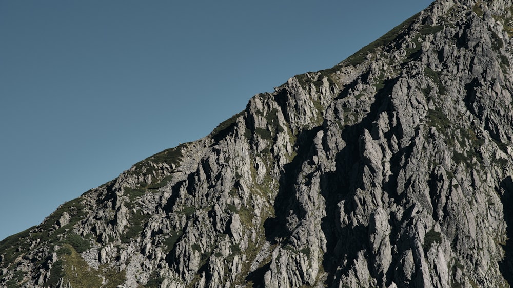 a large mountain with a very tall peak