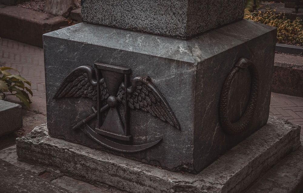 a statue of an angel holding a sword