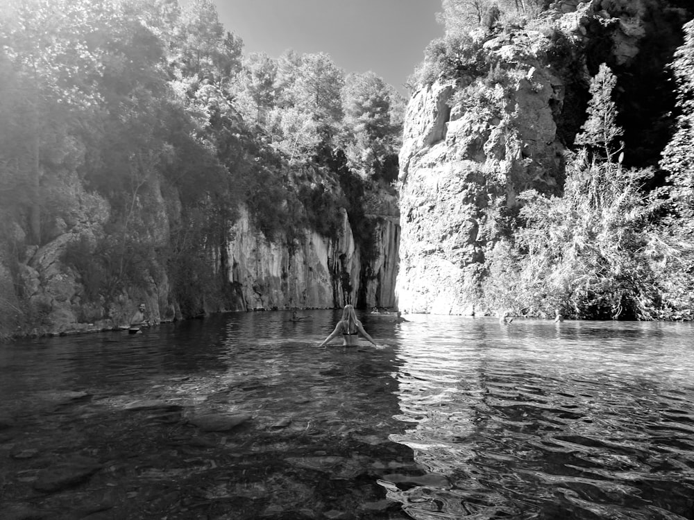 a person in a boat on a body of water