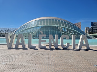 A scenic view of Valencia's skyline with modern buildings and historical architecture.