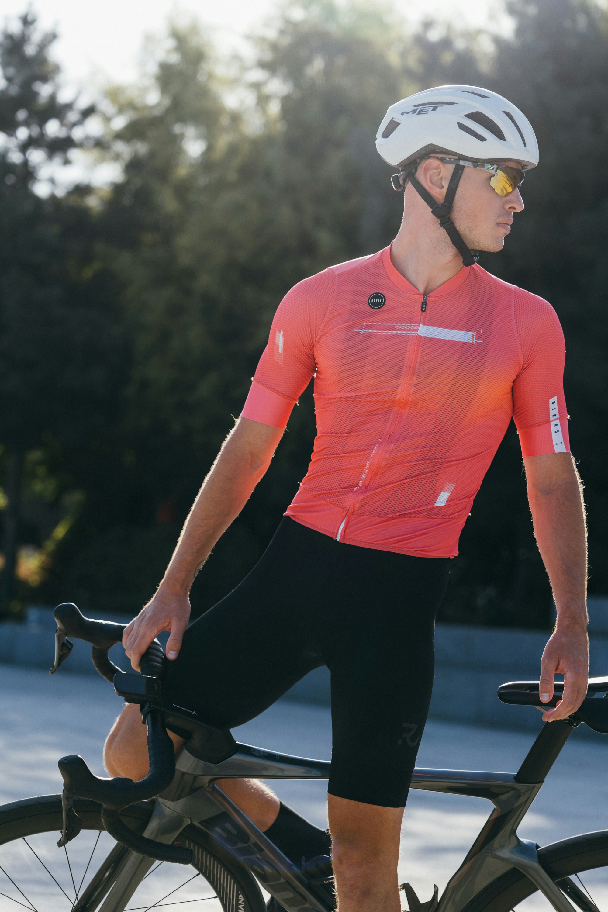 a man riding a bike down a street