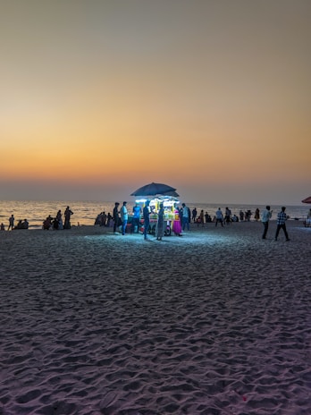 A scenic view of a Thai street food stall at sunset.