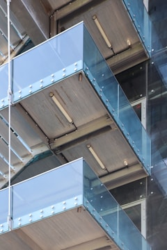 a close up of a building with glass balconies