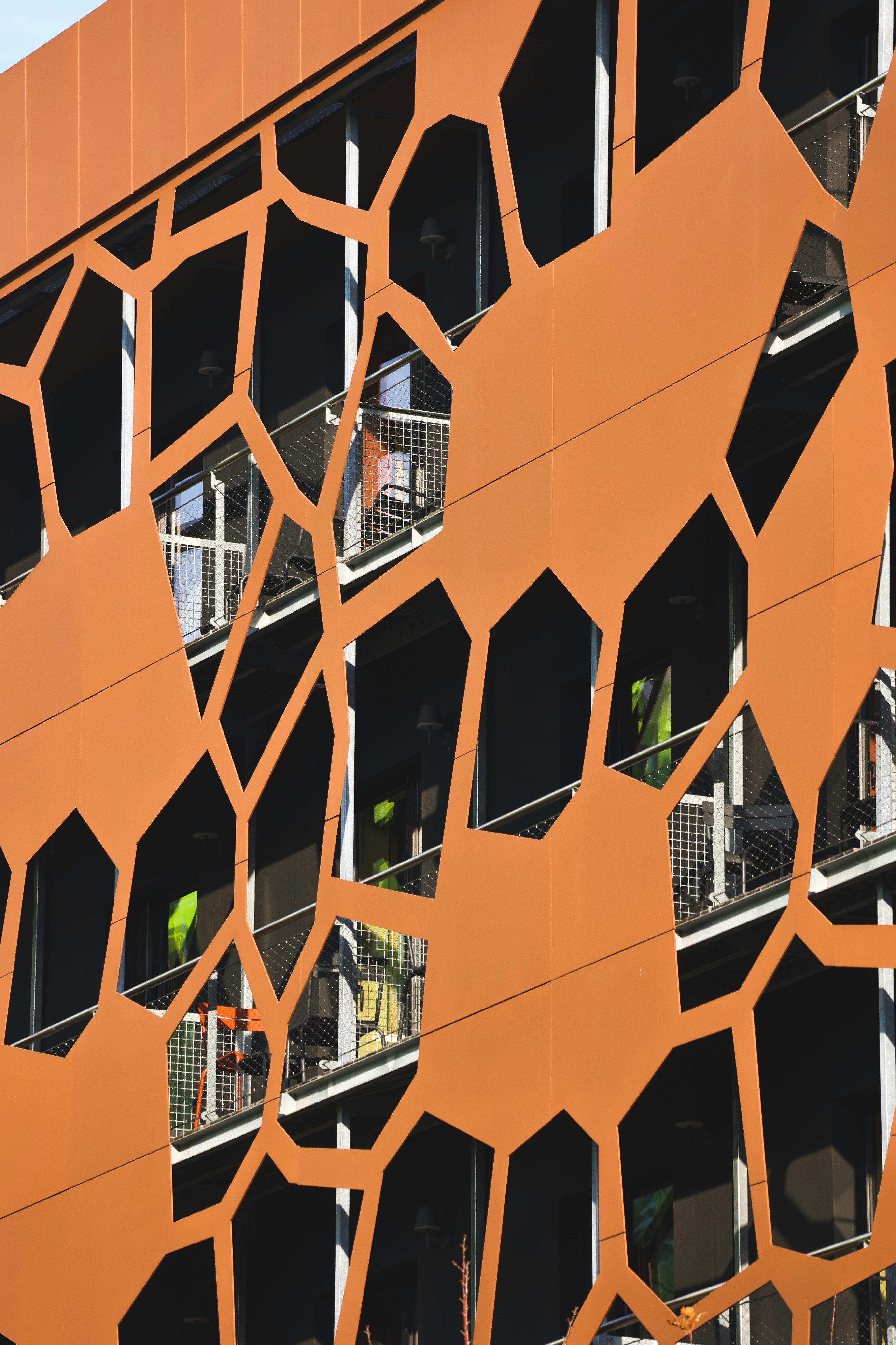 a large orange building with lots of windows
